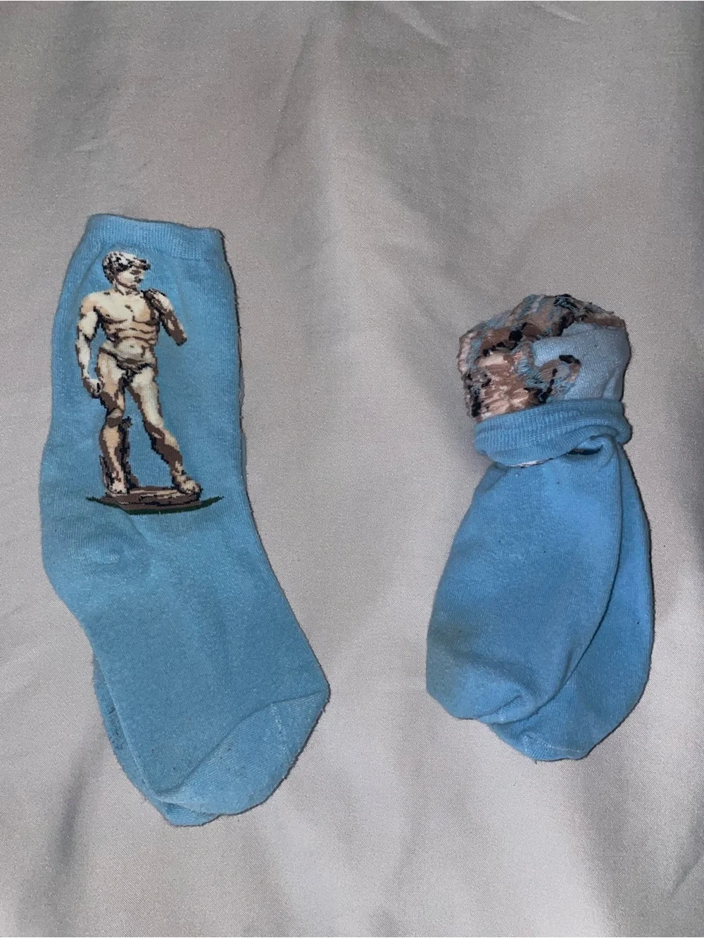 Men's Light Blue Crew Socks with Statue Motif